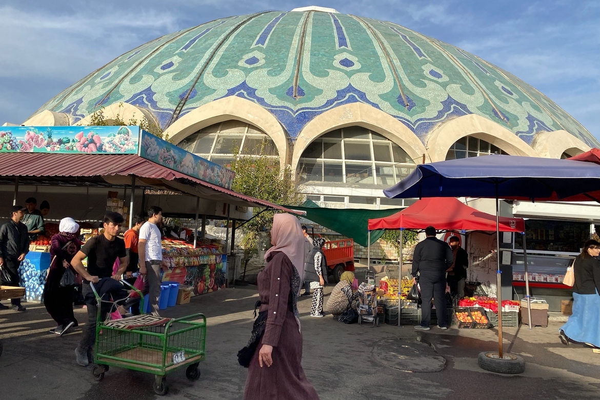 In the streets of a city in Central Asia, an increasing number of people can be seen wearing traditional Muslim attire.