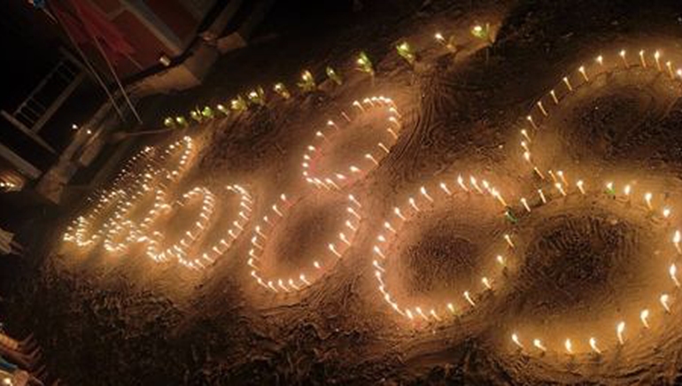 A Buddhist light festival in the village Bone To was interrupted by a massacre on Oct. 6. The image shows a similar light wake in the village.